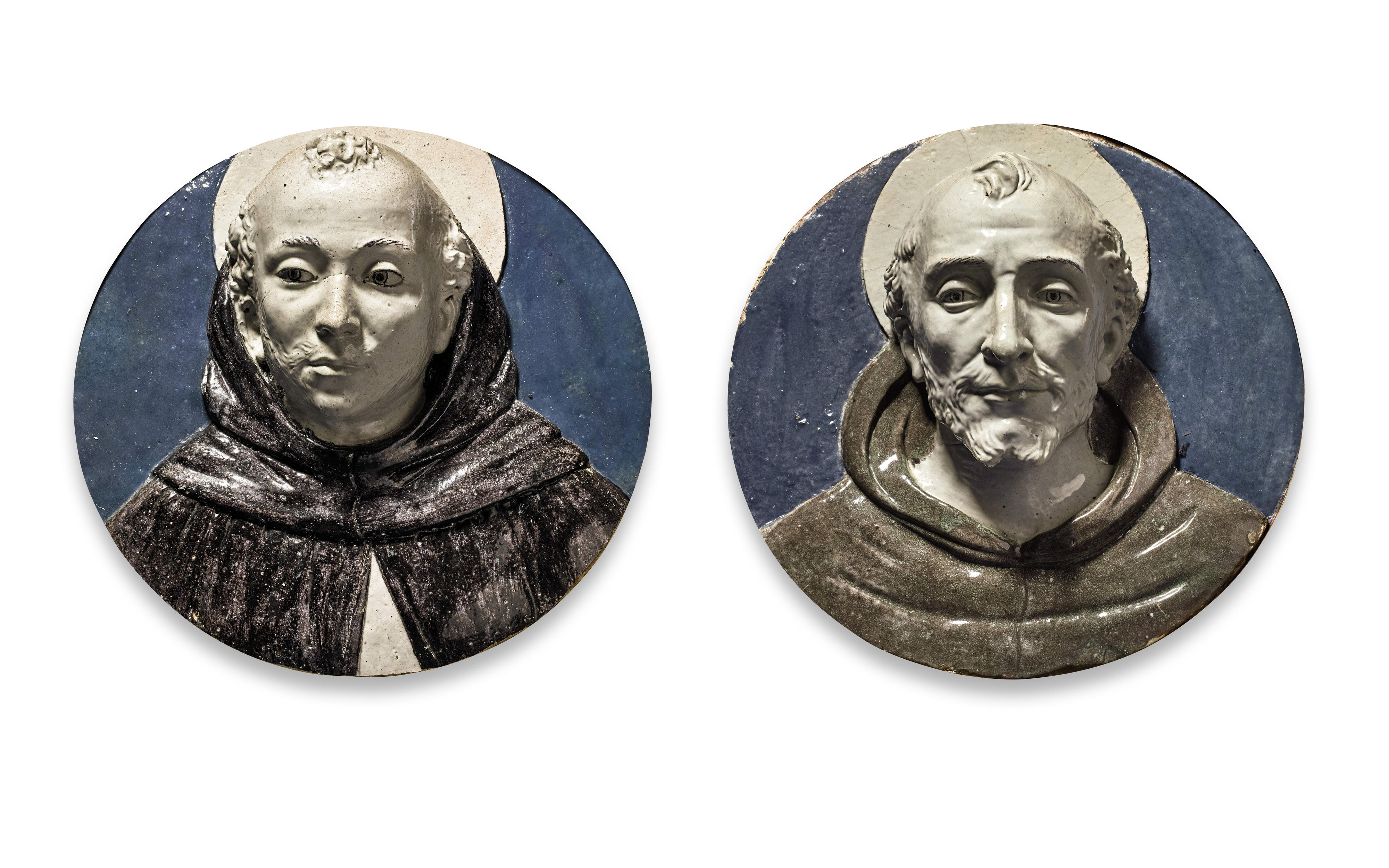 Pair of Reliefs of Saint Dominic and Saint Francis